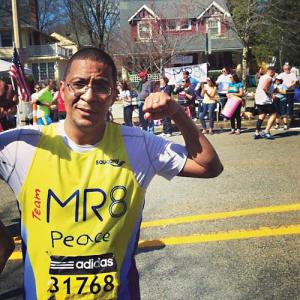 Team MR8 member Harry Benzan, Martin Richard’s soccer coach, did 27 push-ups when he finished the race, despite the pain and dehydration. “It was one of the greatest honors in my life.” Photo courtesy Harry Benzan